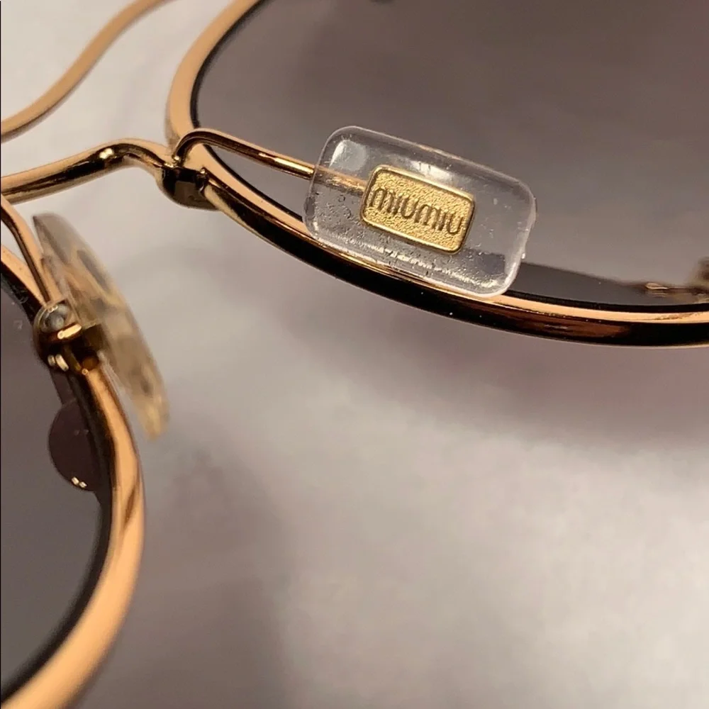 Miu Miu Butterfly Made in Italy hardly preloved